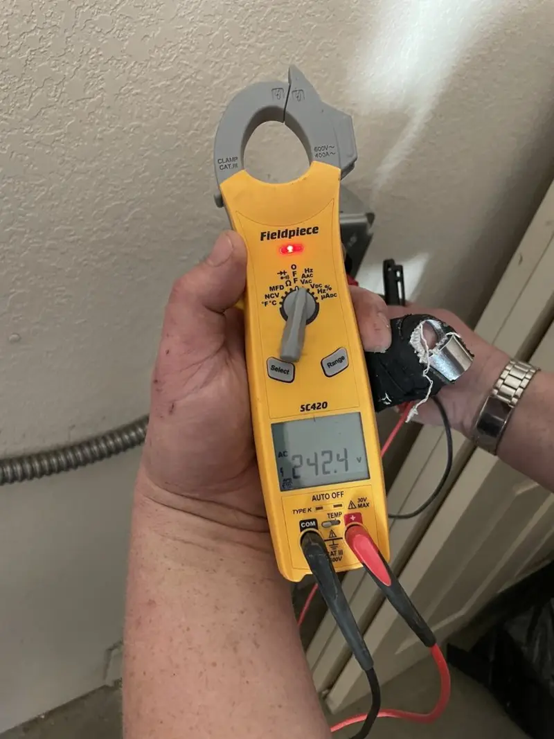 Voltage testing with clamp meter during Circuit Breaker Repair in Wisconsin Rapids